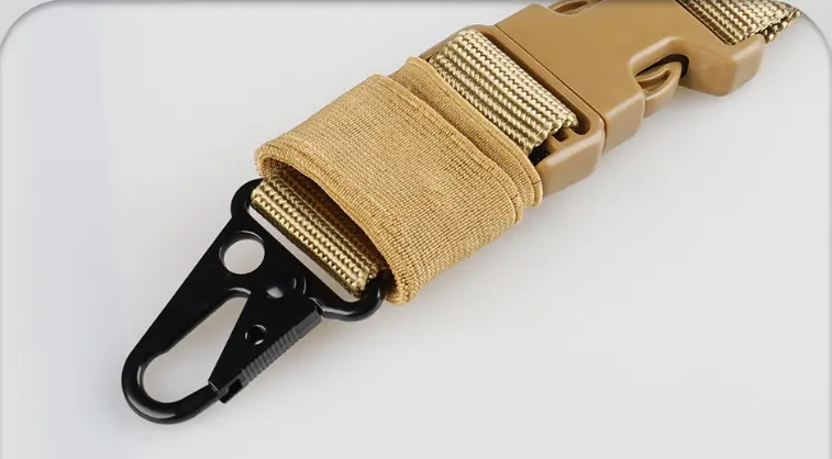 Close-up of the quick-release clip on the tactical gun sling
