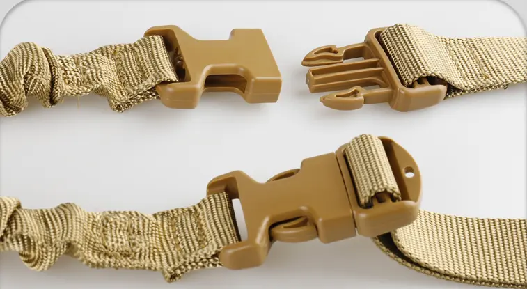 Detail of the durable plastic adjustment buckle on the gun sling