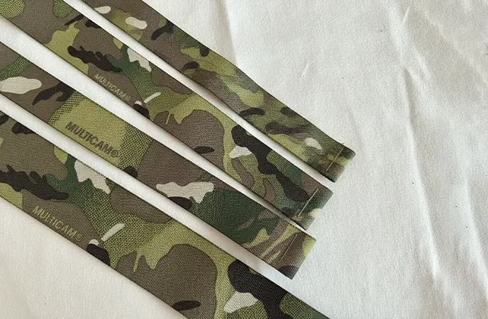 Rolls of authentic MultiCam® pattern nylon webbing featuring IRR compliance and a durable jacquard weave.